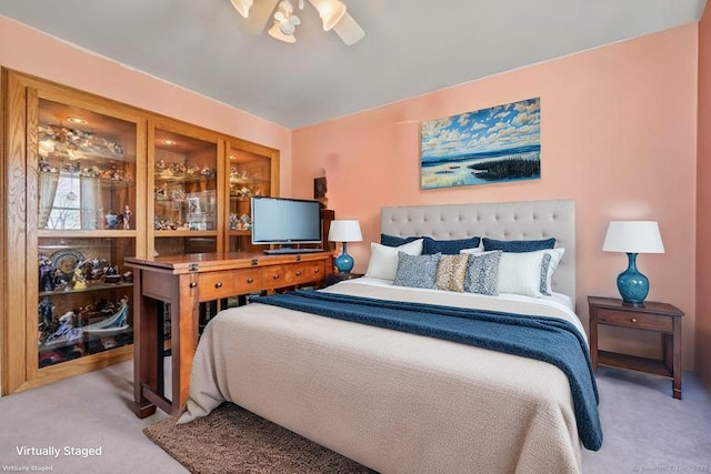 bedroom with carpet flooring and ceiling fan