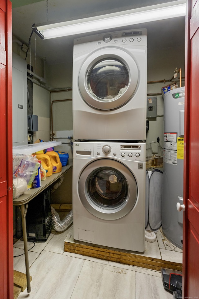 45 Roseland Park Rd, Woodstock, CT 06281 - clothes washing area featuring stacked washing machine and dryer and water heater