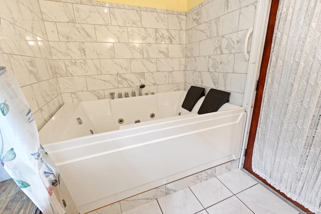 45 Roseland Park Rd, Woodstock, CT 06281 - bathroom featuring a tub with jets and marble look tiles