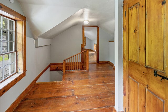 45 Roseland Park Rd, Woodstock, CT 06281 - bonus room with vaulted ceiling, hardwood / wood-style floors, and baseboards