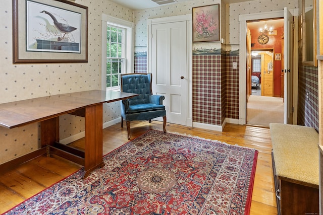 45 Roseland Park Rd, Woodstock, CT 06281 - living area with wallpapered walls, wood finished floors, and baseboards