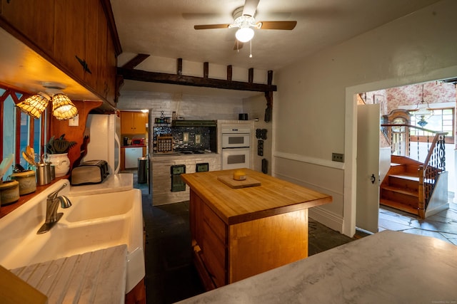 45 Roseland Park Rd, Woodstock, CT 06281 - kitchen featuring butcher block counters, a ceiling fan, double oven, fridge, and a center island