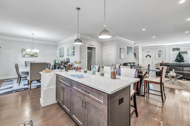 74 Sterling St, Fairfield, CT 06825 - kitchen featuring a kitchen breakfast bar, open floor plan, dark wood-type flooring, and recessed lighting