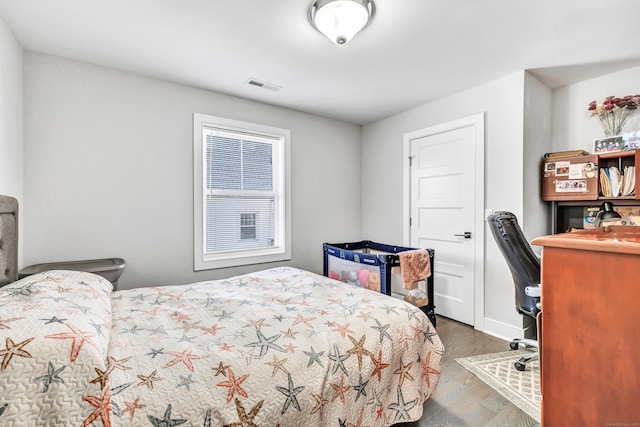 74 Sterling St, Fairfield, CT 06825 - bedroom with visible vents and wood finished floors