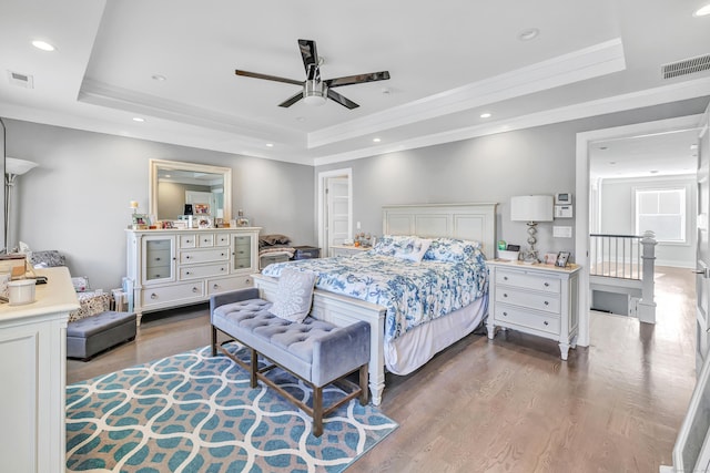 74 Sterling St, Fairfield, CT 06825 - bedroom with a tray ceiling, visible vents, wood finished floors, and ornamental molding