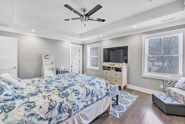 74 Sterling St, Fairfield, CT 06825 - bedroom featuring a tray ceiling, crown molding, dark wood-style flooring, and visible vents