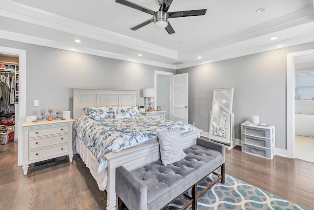 74 Sterling St, Fairfield, CT 06825 - bedroom featuring crown molding, dark wood-type flooring, ensuite bath, a spacious closet, and recessed lighting