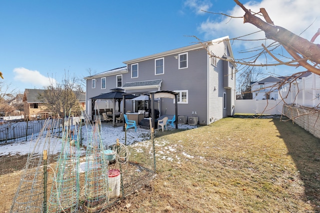 74 Sterling St, Fairfield, CT 06825 - back of house with an outdoor living space, a yard, a patio area, a gazebo, and a fenced backyard