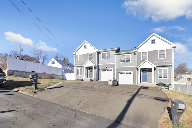 74 Sterling St, Fairfield, CT 06825 - townhome / multi-family property featuring an attached garage, a residential view, fence, driveway, and entry steps