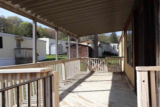 325 Kelly Rd Unit Vt44, Vernon, CT 06066 - deck with a storage shed, an outbuilding, and a residential view