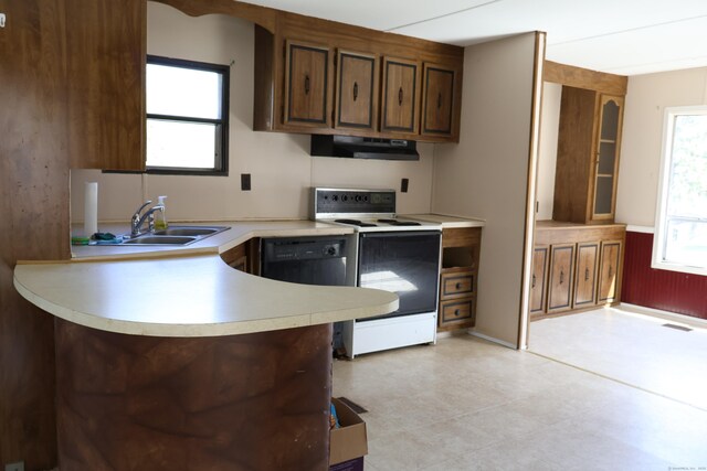 325 Kelly Rd Unit Vt44, Vernon, CT 06066 - kitchen featuring a sink, light countertops, black dishwasher, under cabinet range hood, and white electric stove