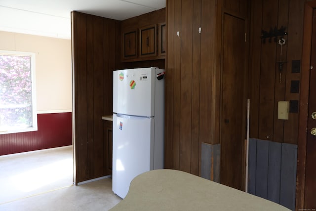 325 Kelly Rd Unit Vt44, Vernon, CT 06066 - kitchen with freestanding refrigerator, light countertops, dark brown cabinetry, and light floors