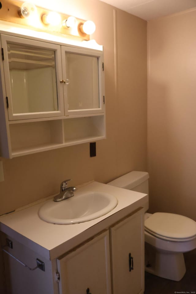 325 Kelly Rd Unit Vt44, Vernon, CT 06066 - half bath featuring vanity and toilet