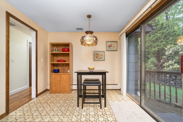 214 Candlewyck Dr, Newington, CT 06111 - dining space featuring visible vents, baseboards, baseboard heating, and built in features