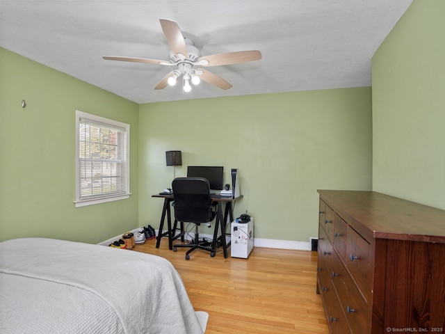 134 Painter Ave, West Haven, CT 06516 - bedroom featuring baseboards, a ceiling fan, and light wood-type flooring
