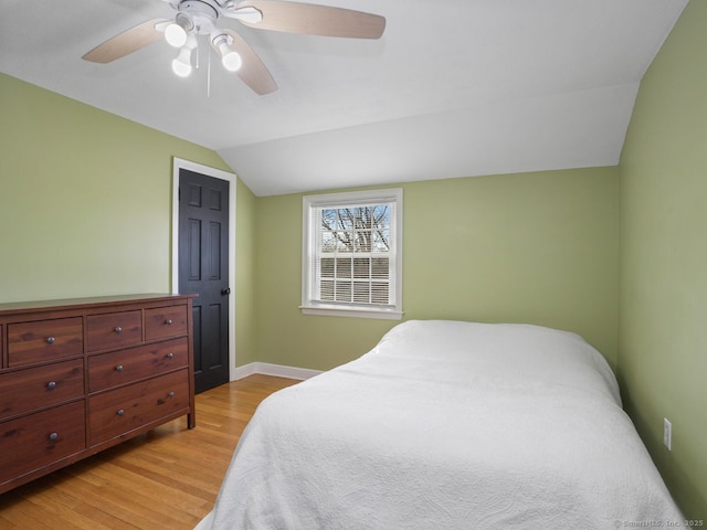 134 Painter Ave, West Haven, CT 06516 - bedroom with baseboards, a ceiling fan, light wood-style flooring, and lofted ceiling