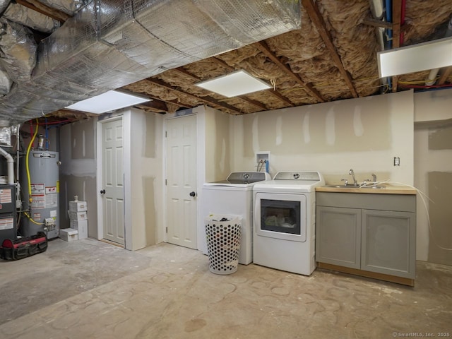 134 Painter Ave, West Haven, CT 06516 - clothes washing area with water heater, separate washer and dryer, cabinet space, and a sink