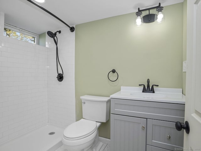 134 Painter Ave, West Haven, CT 06516 - bathroom with toilet, a tile shower, and vanity