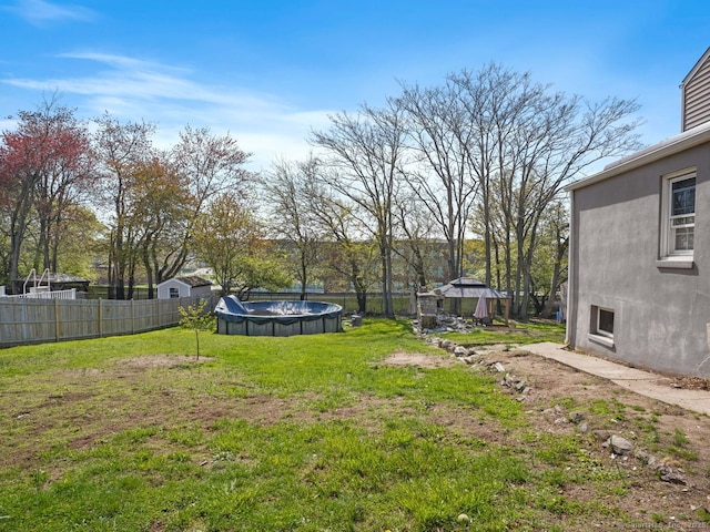 134 Painter Ave, West Haven, CT 06516 - view of yard featuring a gazebo, fence, and a fenced in pool