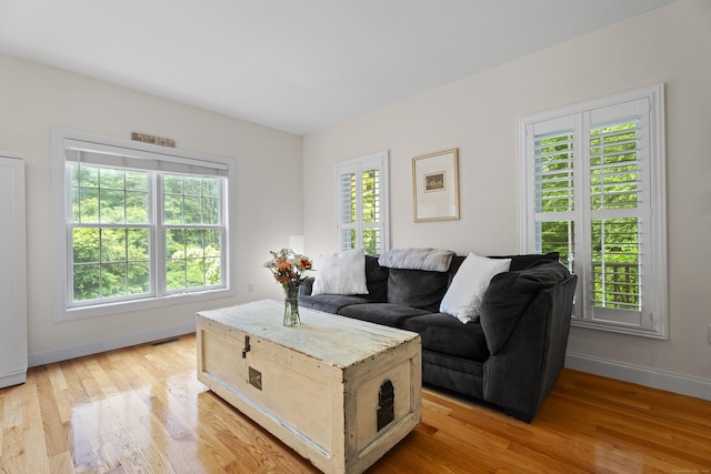 202 Horse Hill Rd, Westbrook, CT 06498 - living area featuring plenty of natural light, light wood-type flooring, and baseboards