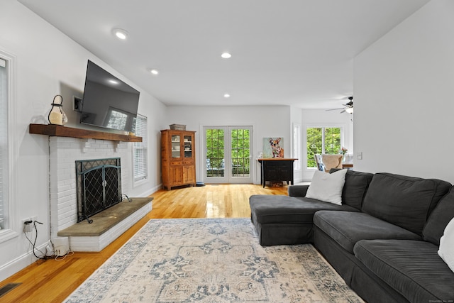 202 Horse Hill Rd, Westbrook, CT 06498 - living area featuring a fireplace, light wood-style flooring, baseboards, and recessed lighting