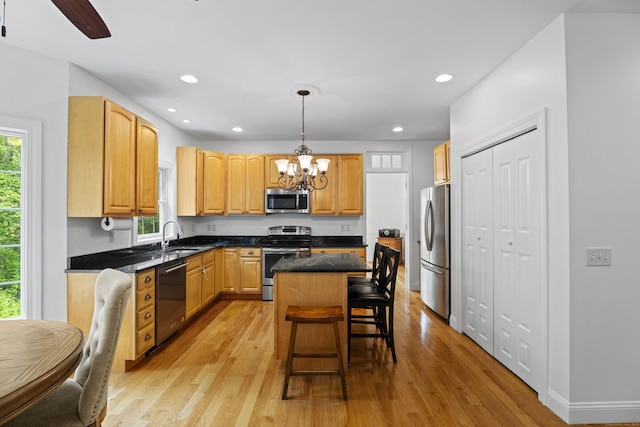 202 Horse Hill Rd, Westbrook, CT 06498 - kitchen featuring appliances with stainless steel finishes, a chandelier, plenty of natural light, light wood-style floors, and recessed lighting