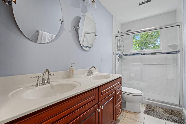202 Horse Hill Rd, Westbrook, CT 06498 - bathroom with toilet, a stall shower, tile patterned floors, and double vanity