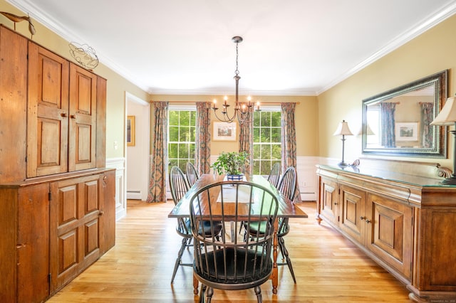 45 Wolf Pit Rd, Southbury, CT 06488 - dining area featuring a chandelier, ornamental molding, light wood finished floors, a baseboard radiator, and a wainscoted wall