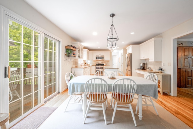 45 Wolf Pit Rd, Southbury, CT 06488 - dining space featuring light wood-type flooring, a chandelier, and recessed lighting