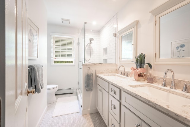45 Wolf Pit Rd, Southbury, CT 06488 - full bath featuring baseboard heating, toilet, double vanity, a stall shower, and healthy amount of natural light