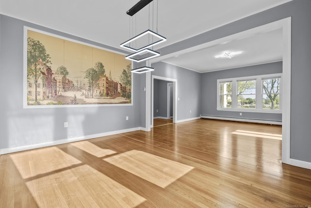 181 Westbourne Pkwy, Hartford, CT 06112 - interior space featuring baseboards, baseboard heating, a chandelier, and wood finished floors