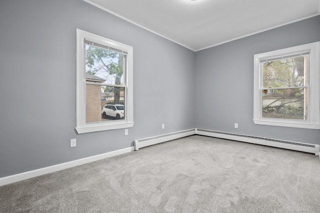 181 Westbourne Pkwy, Hartford, CT 06112 - carpeted empty room featuring crown molding, baseboards, a healthy amount of sunlight, and a baseboard heating unit