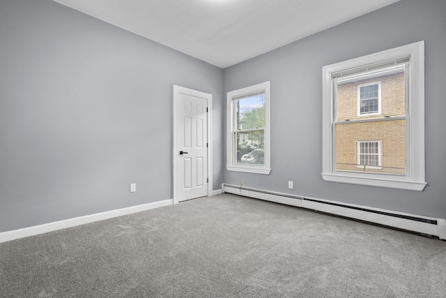 181 Westbourne Pkwy, Hartford, CT 06112 - carpeted empty room featuring baseboards and a baseboard radiator