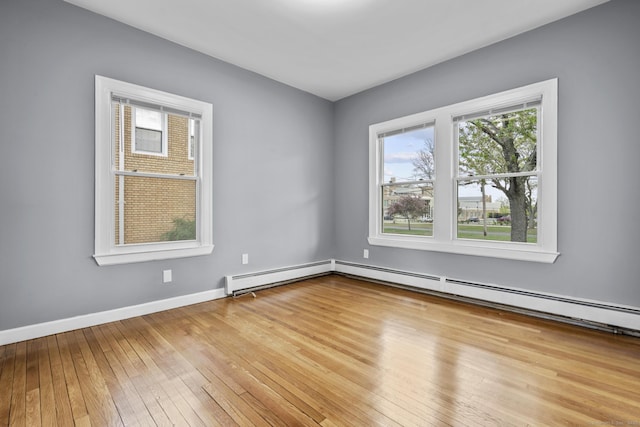 181 Westbourne Pkwy, Hartford, CT 06112 - spare room featuring hardwood / wood-style flooring, baseboards, and baseboard heating