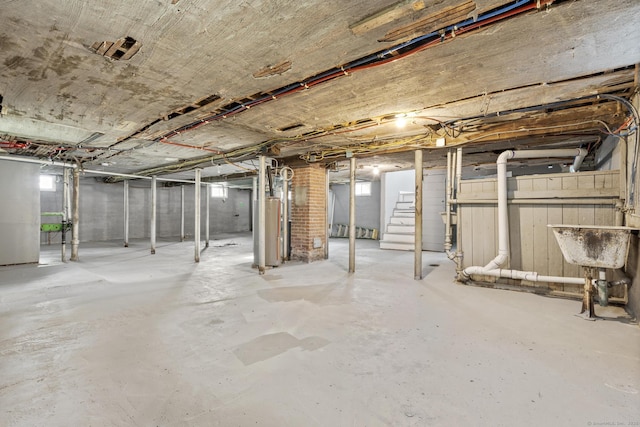 181 Westbourne Pkwy, Hartford, CT 06112 - unfinished below grade area featuring gas water heater and stairs