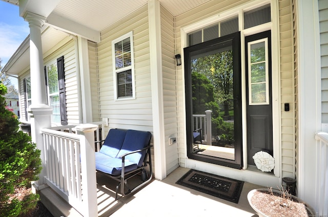 entrance to property with covered porch