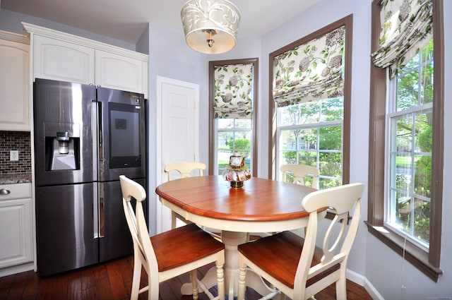 dining room featuring dark wood-type flooring