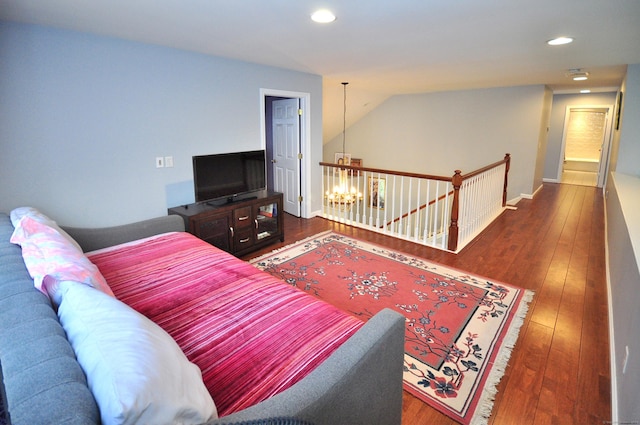 living area featuring recessed lighting and hardwood / wood-style floors