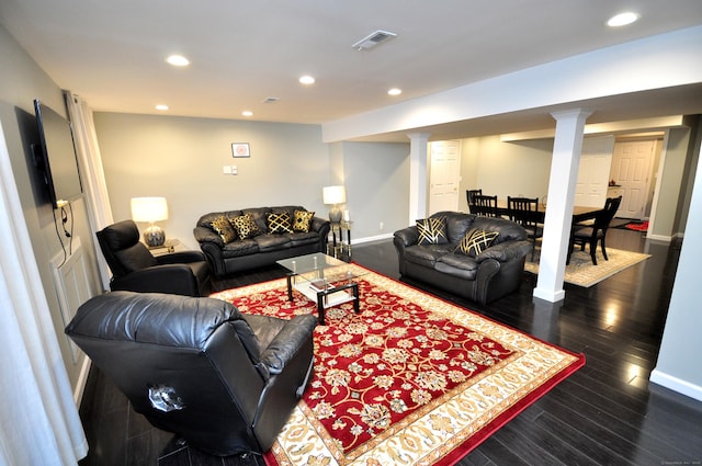 living area with baseboards, recessed lighting, visible vents, and dark wood-type flooring
