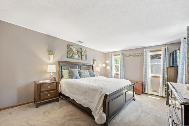 54 Silo Dr, Wethersfield, CT 06109 - bedroom featuring light carpet, a textured ceiling, and baseboards