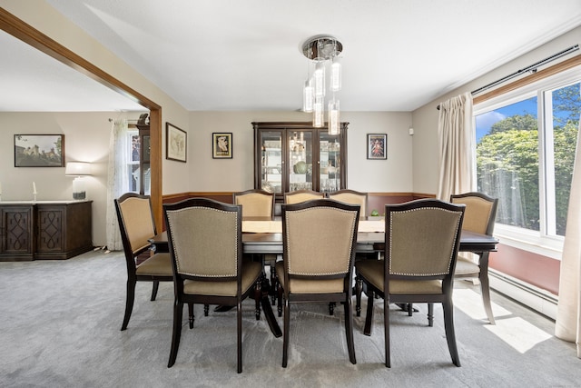 54 Silo Dr, Wethersfield, CT 06109 - dining room with light colored carpet and a baseboard heating unit