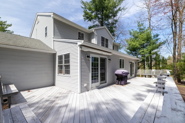 wooden terrace featuring area for grilling