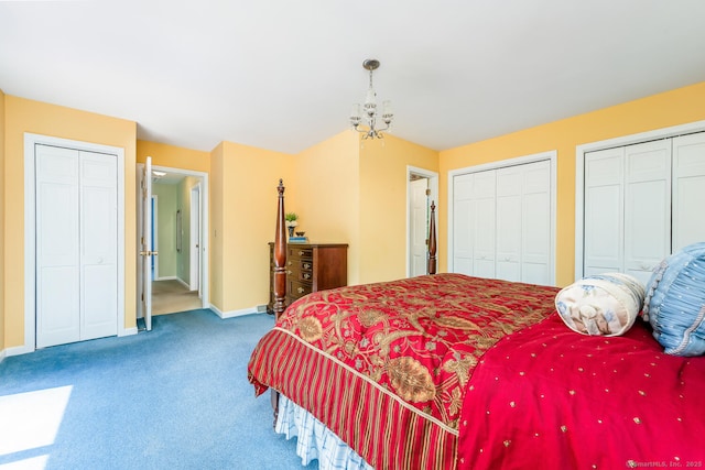 250 Glenn Dr, Stratford, CT 06614 - carpeted bedroom with two closets, baseboards, and a chandelier