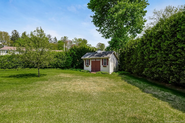 250 Glenn Dr, Stratford, CT 06614 - view of green lawn featuring an outbuilding and view of scattered trees