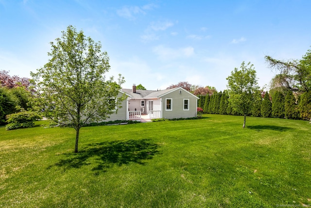 250 Glenn Dr, Stratford, CT 06614 - view of green lawn with a wooden deck