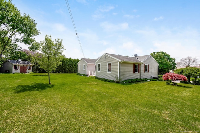 250 Glenn Dr, Stratford, CT 06614 - back of property featuring a yard