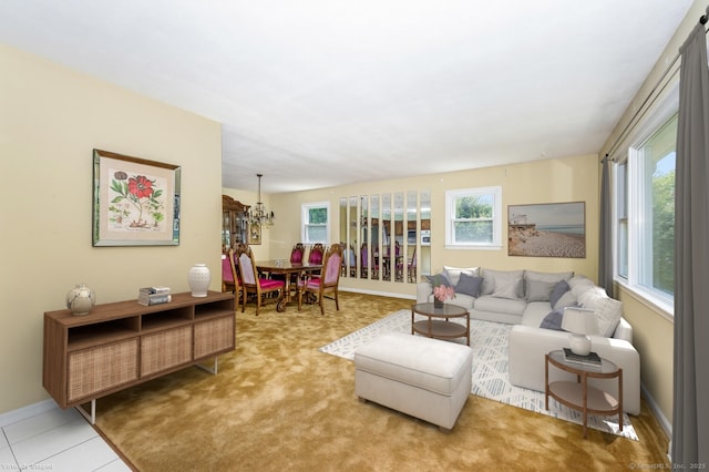250 Glenn Dr, Stratford, CT 06614 - living area featuring a chandelier, baseboards, and carpet floors