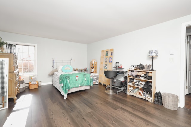bedroom featuring wood finished floors