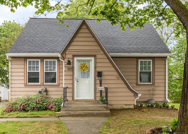 view of front facade featuring a shingled roof