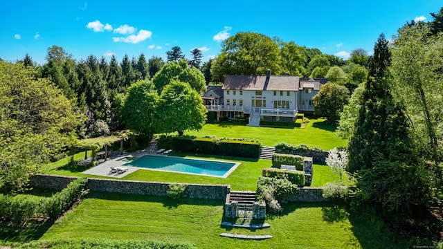 945 Oenoke Rdg, New Canaan, CT 06840 - view of home's community featuring stairway, a yard, and a pool